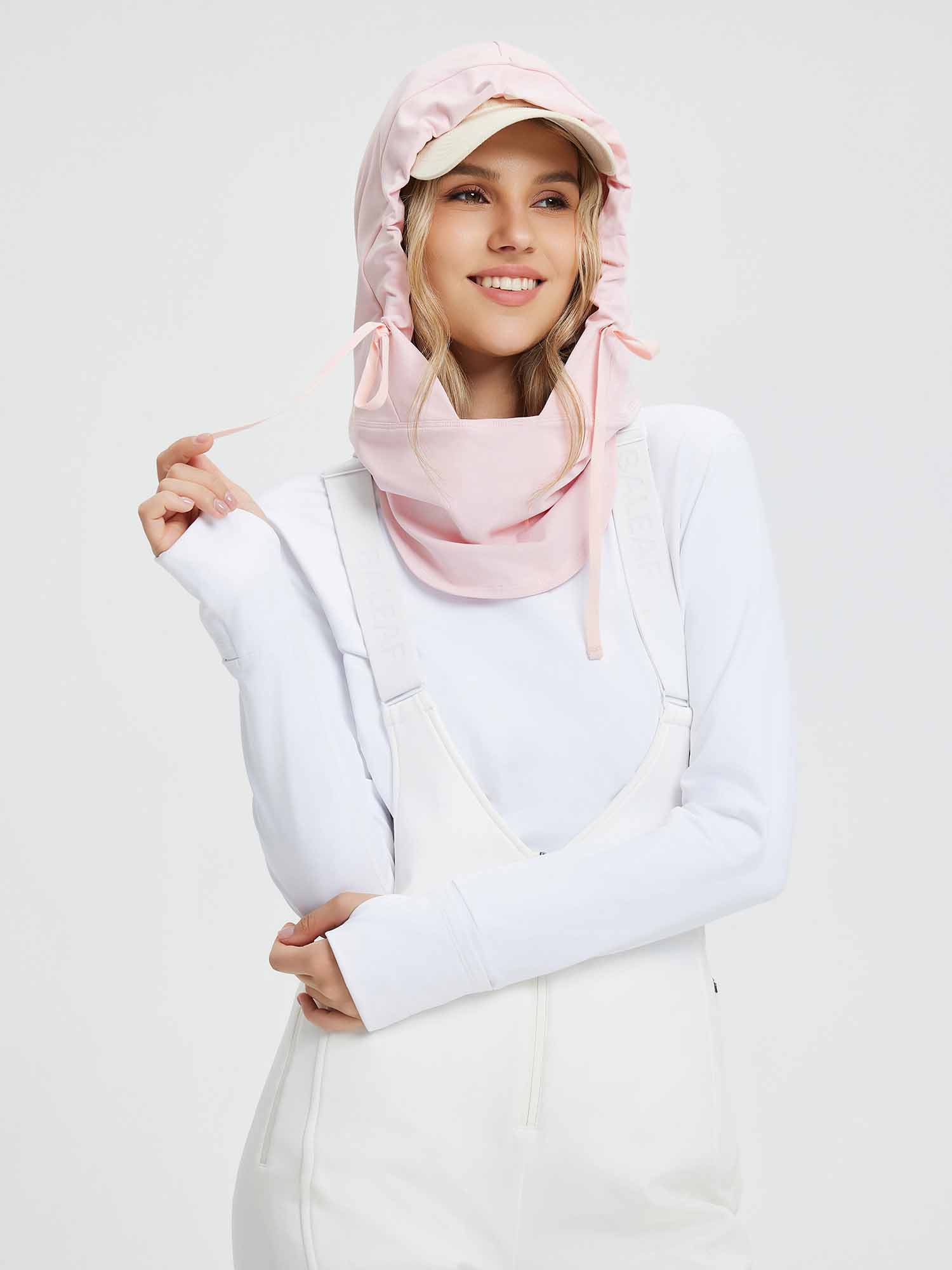 Woman wearing pink unisex skiing waterproof fleece hat with hood and face mask. #color_Light Pink