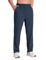 Men's dark navy stretch waist tapered joggers with zippered pockets, athletic wear. #color_Navy Blue
