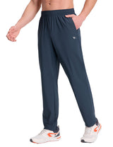 Men's navy tapered joggers with elastic stretch waist and side pockets. #color_Navy Blue