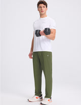 Baleaf men's olive green stretch waist tapered joggers shown during workout. #color_Army Green