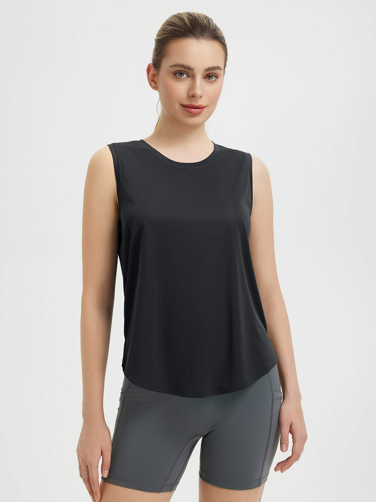 Black women's sleeveless racerback running tank top, scoop neck, curved hem #color_Black