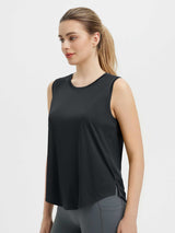 Black women's sleeveless racerback running tank top with scoop neck and side slits. #color_Black