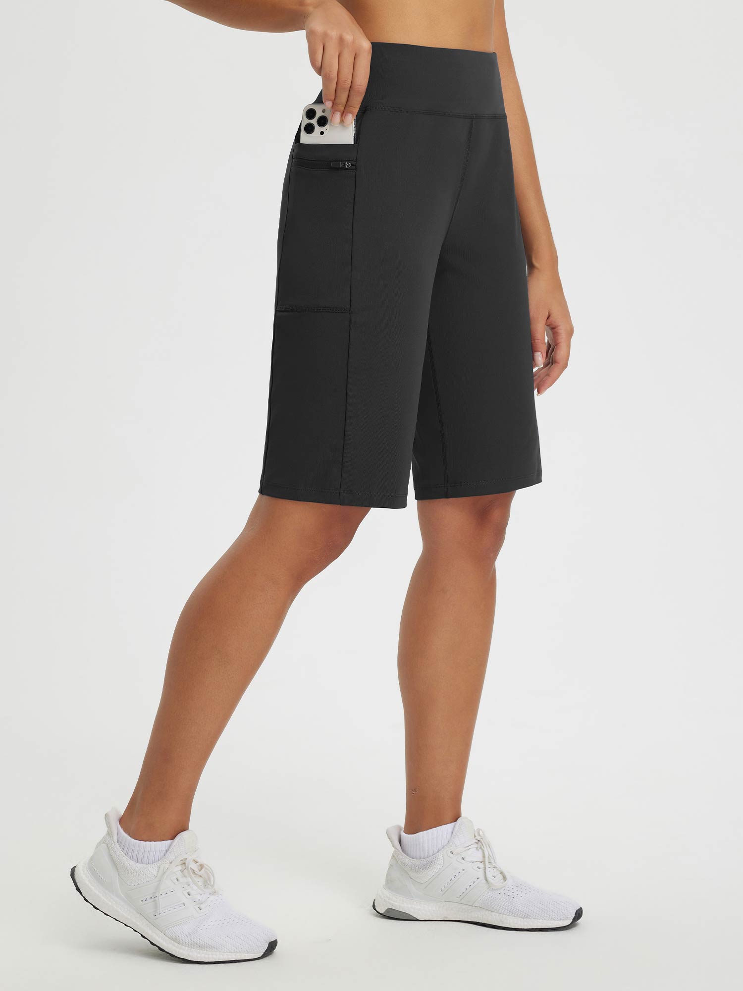 Move-Freely Set: Black high-rise athletic shorts with zippered pocket for phone. #color_Black