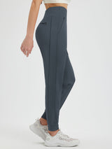 Charcoal grey fleece-lined running joggers featuring a high waist, zippered pocket, and stretchy fabric. #color_Charcoal Gray