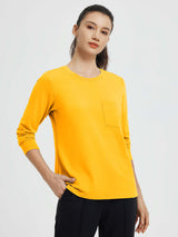 Yellow long-sleeve running top with crewneck and chest pocket #color_Yellow