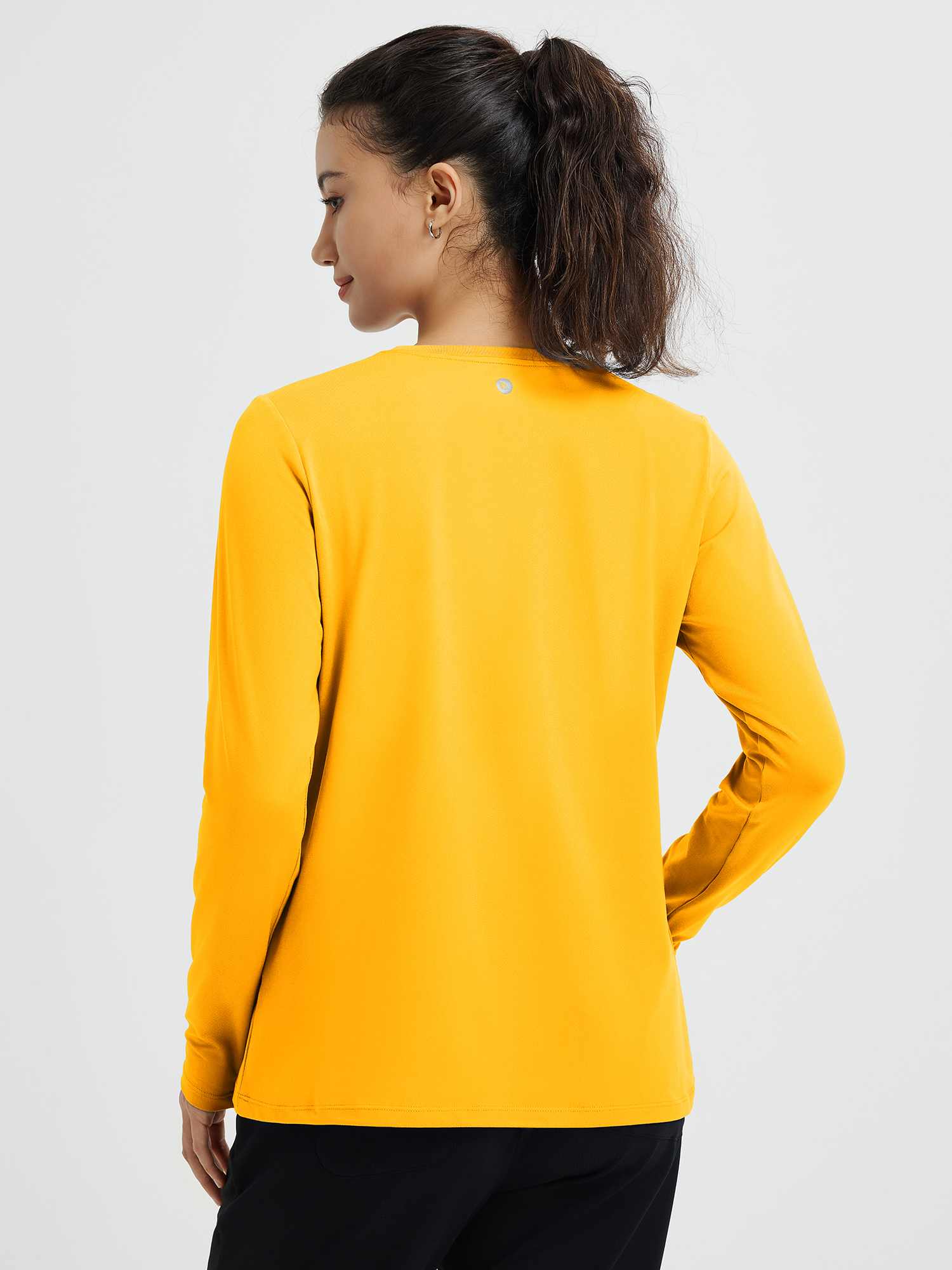 Running crewneck long-sleeve top in yellow, back view, lightweight fabric #color_Yellow