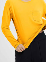 Stretchy yellow crewneck long-sleeve running top with chest pocket. #color_Yellow