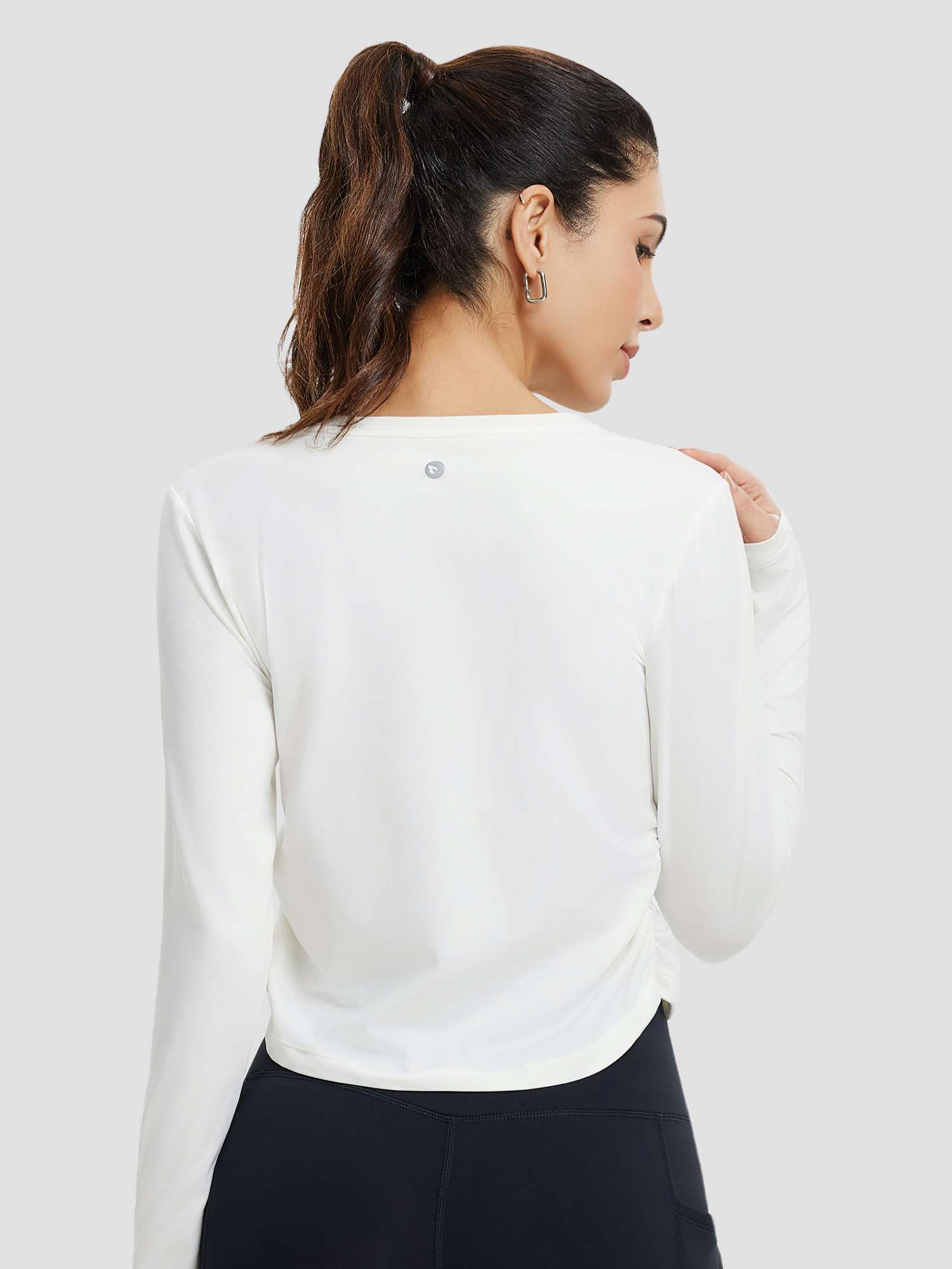 Women's white long-sleeve running t-shirt with crew neck and side ruched detail. #Color_Star White