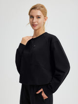 Black raglan fleece long-sleeve running top with zipper chest pocket #color_Black