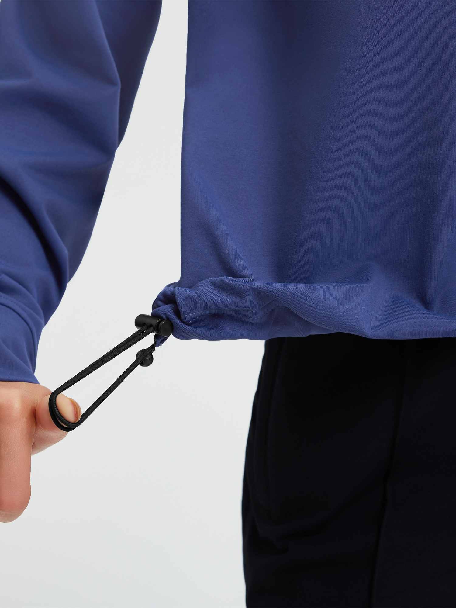 Blue raglan fleece running top hem detail with adjustable drawstring. #color_Navy Blue