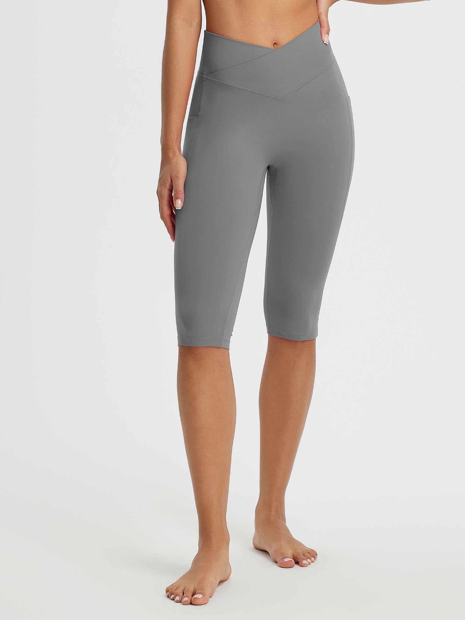 Women's grey 14" high-waisted crossover capris with side pockets for yoga #color_Dark Gray