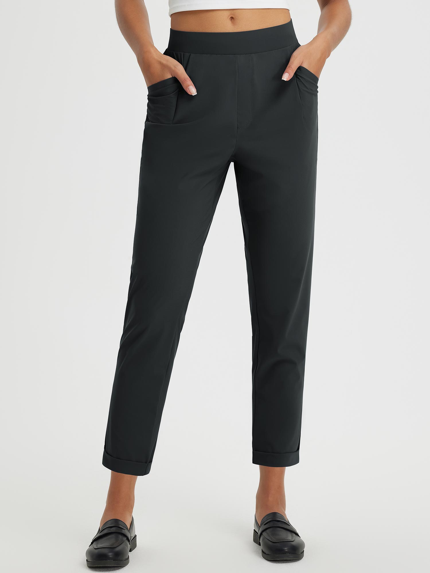 Black high-rise tapered trousers with cuffed hem for casual sun protection. #color_Anthracite