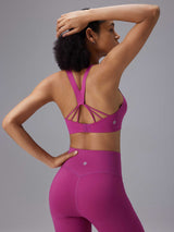 Activewear set: magenta low-impact sports bra with strappy back and high-rise leggings. #color_Hot Pink