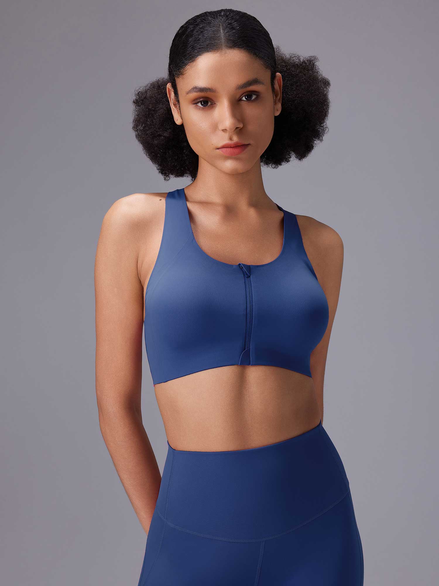 Blue front zip sports bra and high-rise active leggings activewear set for yoga. #color_Blue