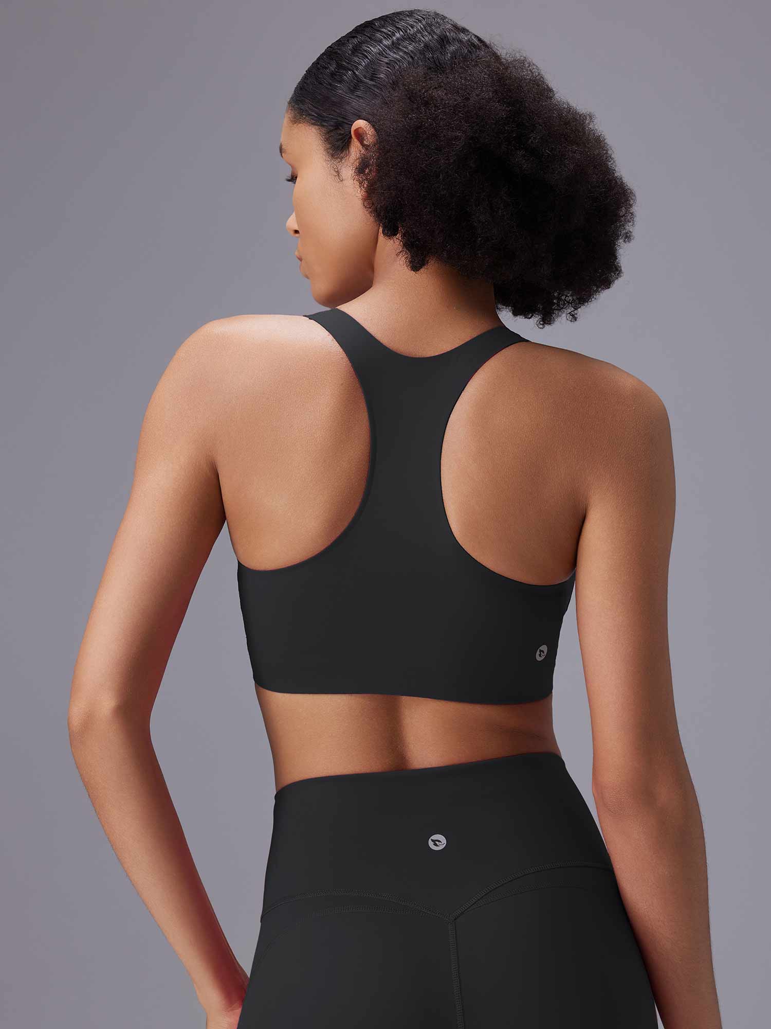 Black racerback sports bra and high-rise shorts from High-Impact Training Set, for running/HIIT. #color_Black