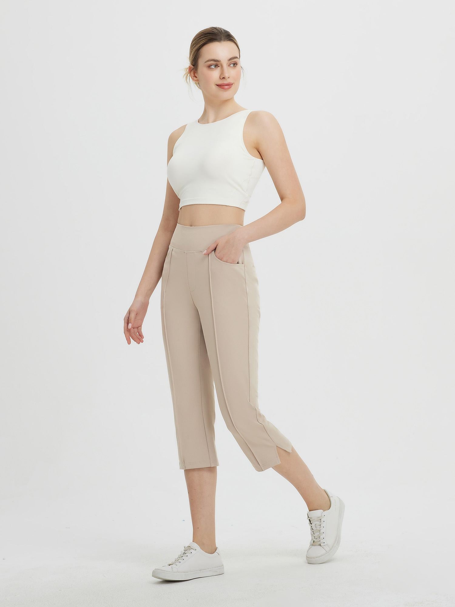 Women's high-waisted khaki capri pants with pockets, 21-inch inseam. #color_Khaki