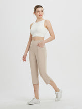 Women's high-waisted khaki capri pants with pockets, 21-inch inseam. #color_Khaki