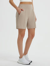 Women's khaki 7" Bermuda long shorts with a high waist and side pockets #color_Khaki