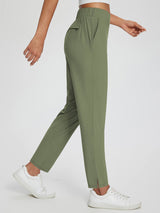 Olive green high-waist tapered yoga pants, business casual, with split hem and pockets. #color_Army Green