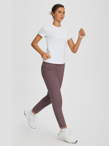 Sculpt High-Waist Tapered Yoga Pants in dusty plum with split hem, woman running. #color_Dark Brown