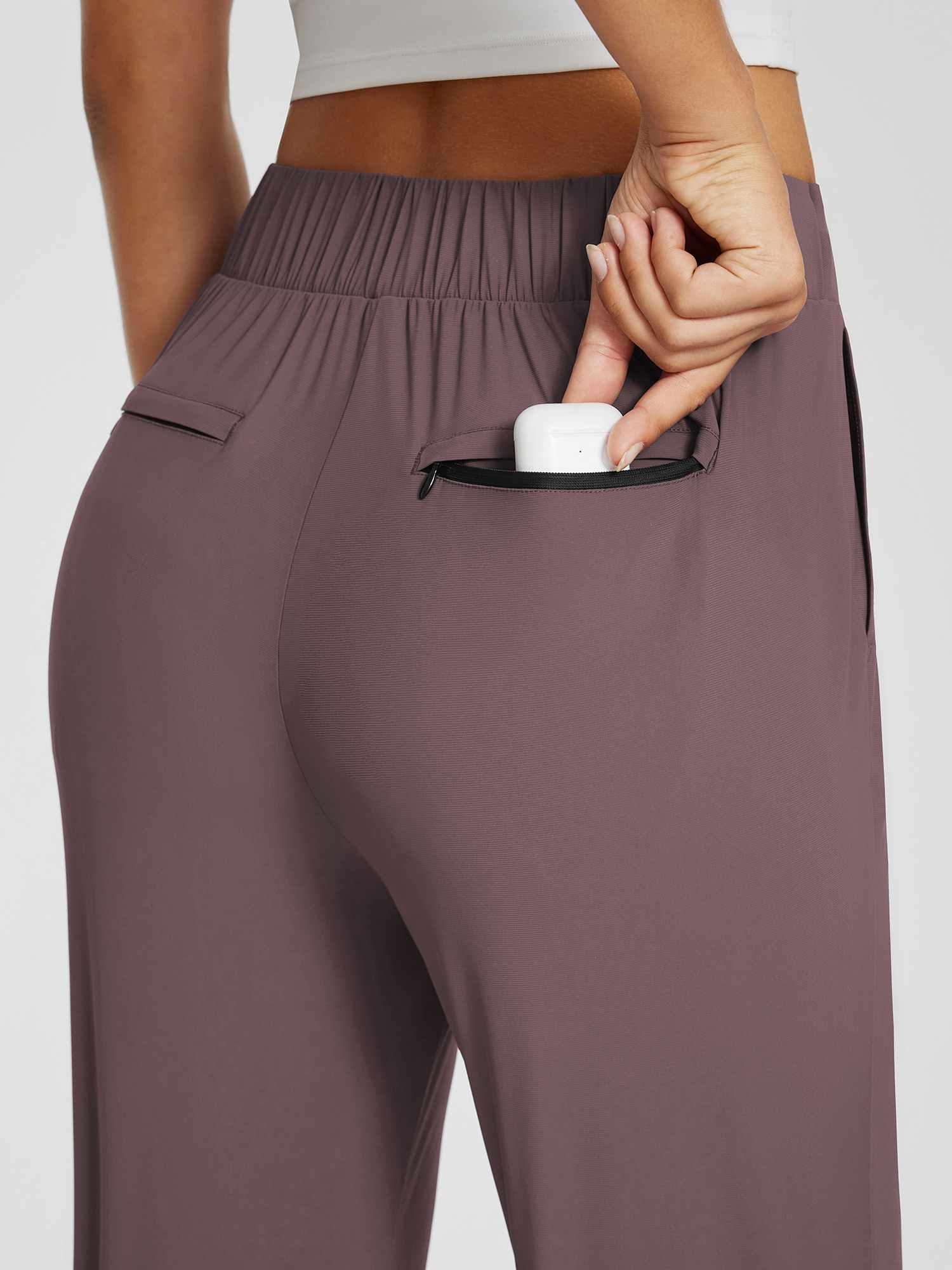 Taupe Sculpt high-waist tapered yoga pants with zippered back pocket. #color_Dark Brown