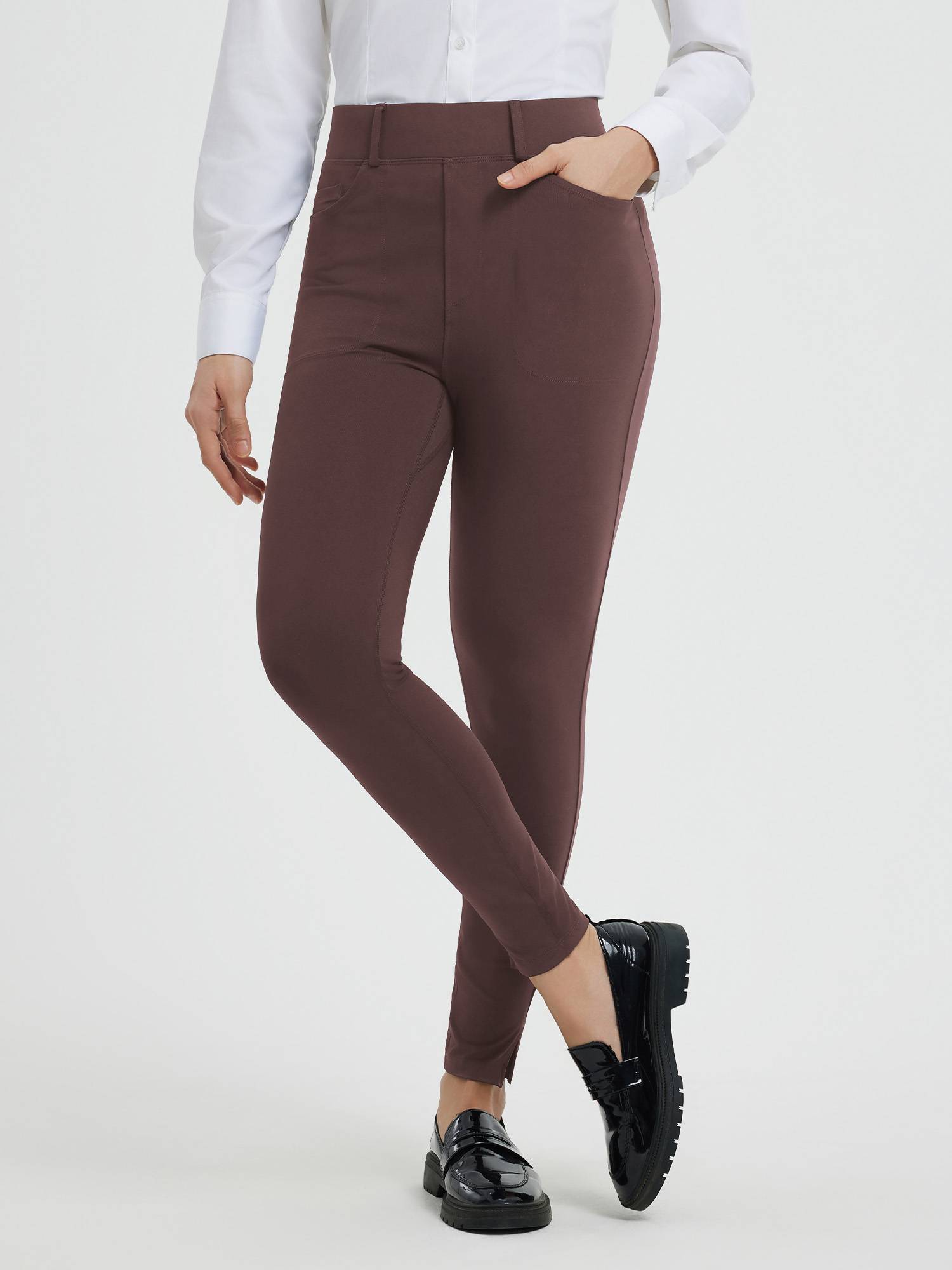 Women's brown high-waisted business yoga pants with 7/8 split hem and pockets. #color_Dark Brown
