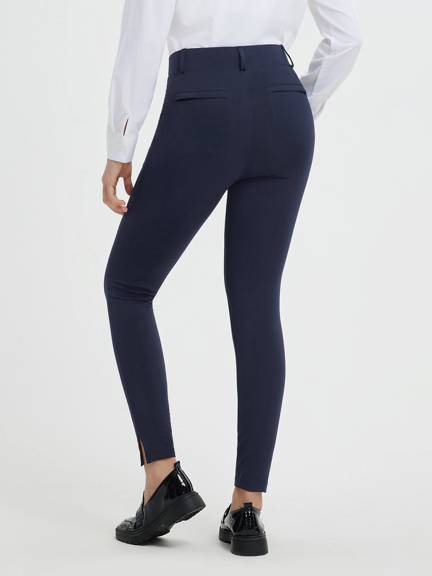Women's navy 7/8 split hem yoga business pants, high-waisted, moisture-wicking. #color_Navy Blue