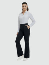 Woman models black high-waisted flared business yoga pants. #Color_Black
