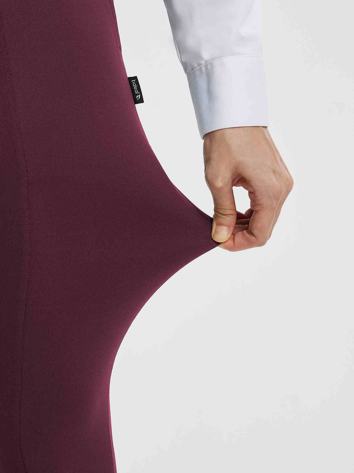 Close-up of stretchy burgundy Baleaf high-waisted flared pants fabric #Color_Wine Red
