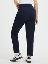 Navy high-waisted tapered yoga pants with 7/8 ankle length, side pockets, Bengol label. #color_Navy Blue