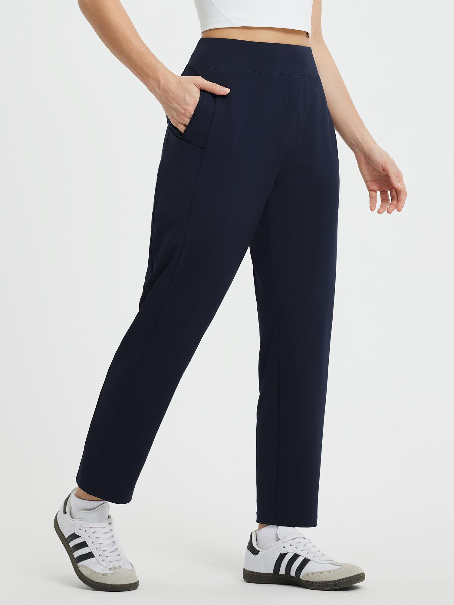 Yoga High Waisted Tapered Pants in navy blue with ankle length and pockets. #color_Navy Blue