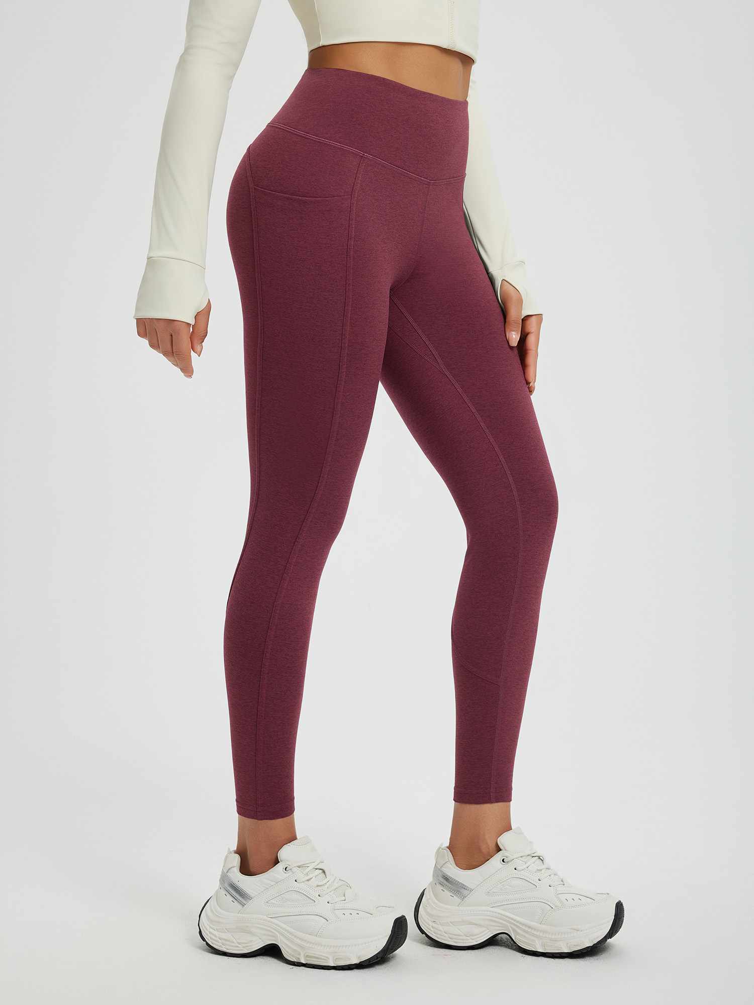 Women's burgundy heathered fleece-lined high-waisted yoga leggings with side pockets. #color_Wine Red