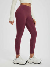 Women's burgundy heathered fleece-lined high-waisted yoga leggings with side pockets. #color_Wine Red