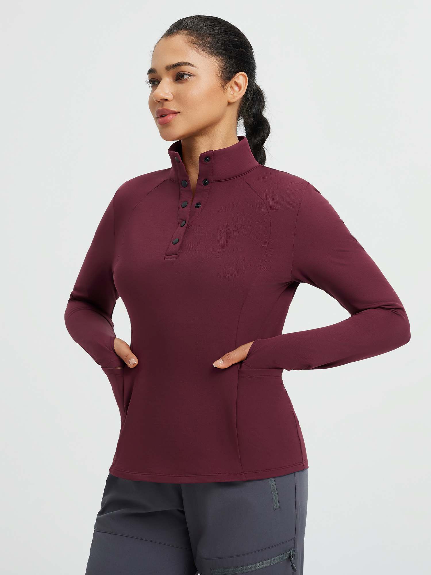 Women's burgundy half-snap long-sleeve yoga top with thumbholes and pockets. #color_Wine Red