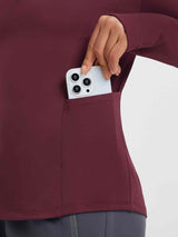 Maroon women's fleece-lined long-sleeve yoga top with side pocket #color_Wine Red