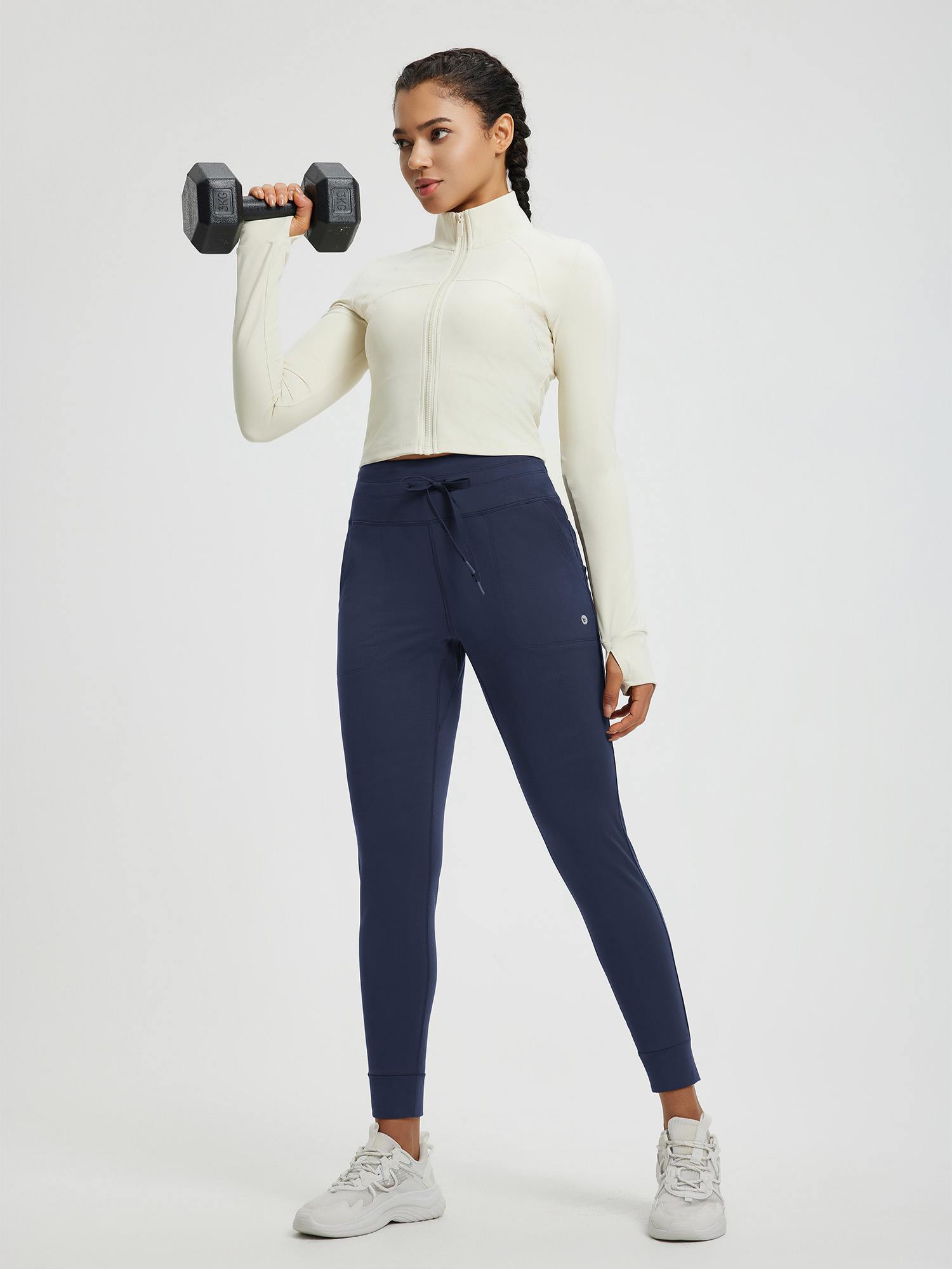 Women's navy blue cuffed fleece high-waisted yoga leggings with jogger fit. #color_Navy Blue