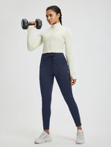 Women's navy blue cuffed fleece high-waisted yoga leggings with jogger fit. #color_Navy Blue
