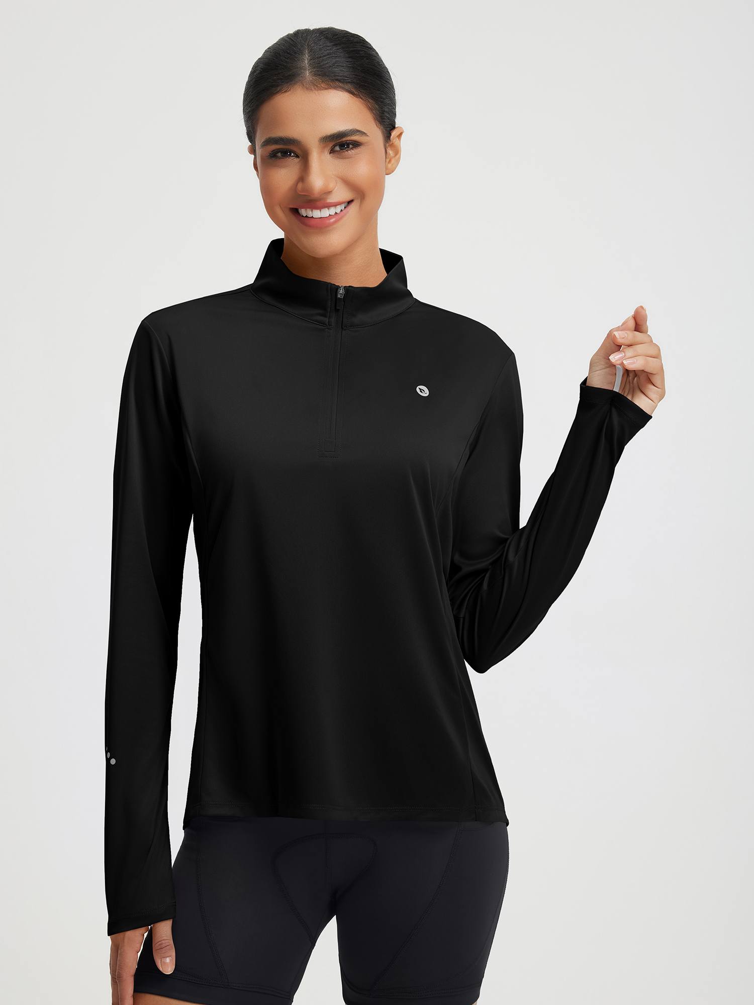 Baleaf women's black UPF 50+ half zip cycling jersey with reflective cuff. #color_Black