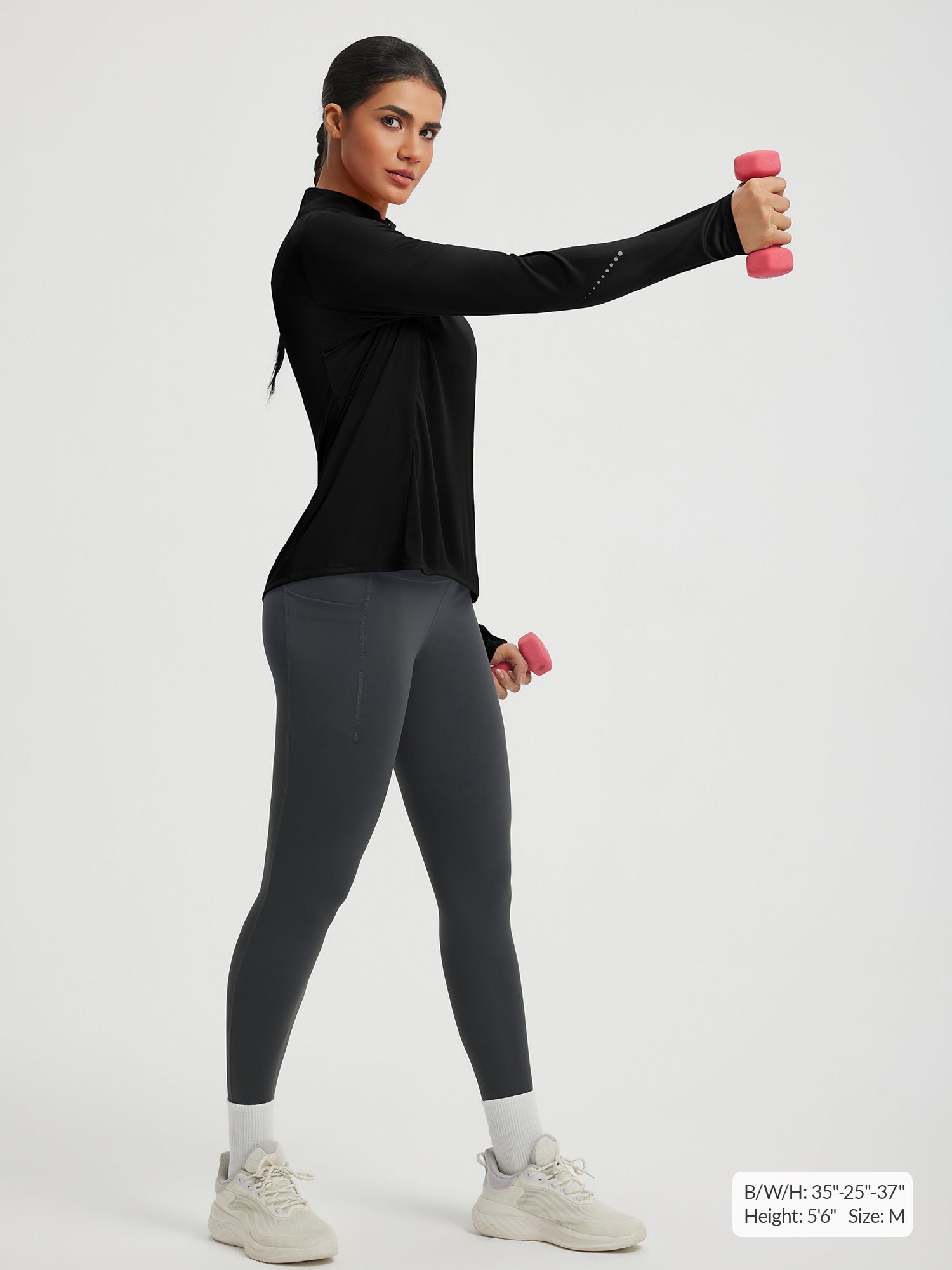 Baleaf UPF 50+ black half zip cycling jersey on active woman #color_Black