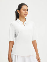 White Baleaf women's UPF 50+ half sleeve polo shirt with quarter zip for activewear. #color_White