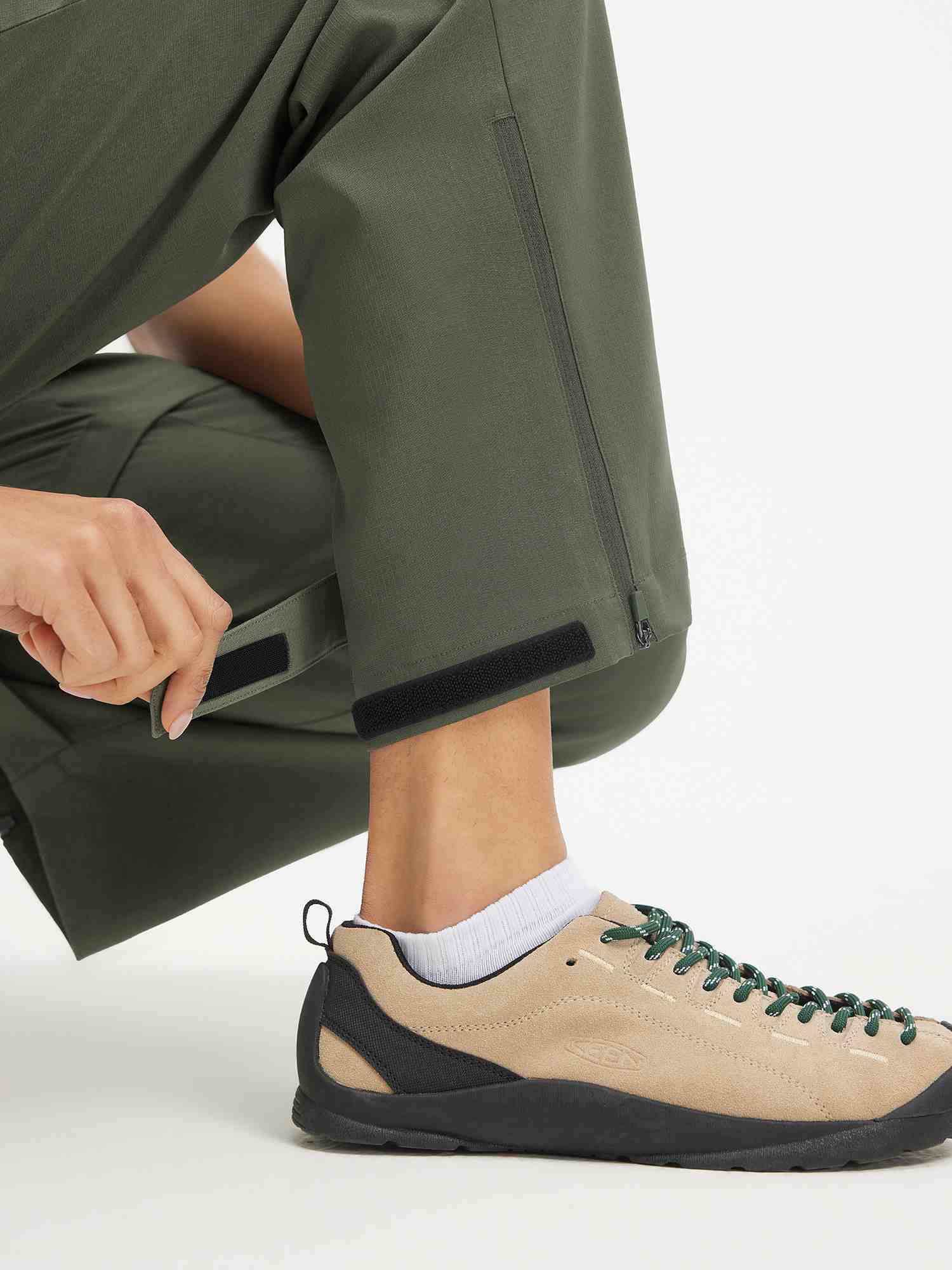 Baleaf olive green convertible hiking pants with adjustable velcro hem and side zipper. #color_Army Green