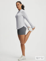 Baleaf grey lightweight UPF 50+ hooded sun jacket, woman stretching. #color_Light Gray