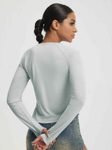 Baleaf UPF 50+ long-sleeve crop sun shirt in light blue with thumbholes. #color_Light Gray