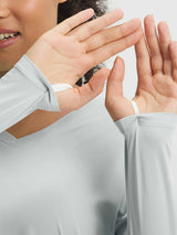 Baleaf UPF 50+ light blue V-neck long-sleeve shirt with thumbholes. #color_Light Gray