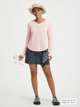 Baleaf UPF 50+ pink V-neck long-sleeve shirt with thumbholes, worn with grey shorts. #color_Pink Dogwood