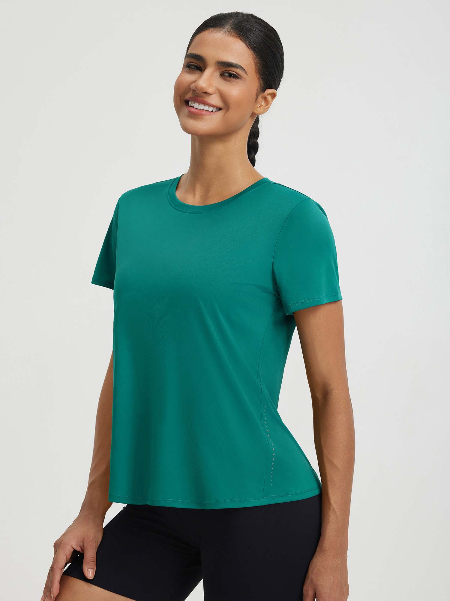 Teal UPF 50+ quick dry athletic short sleeve top with reflective dots. #color_Teal Green
