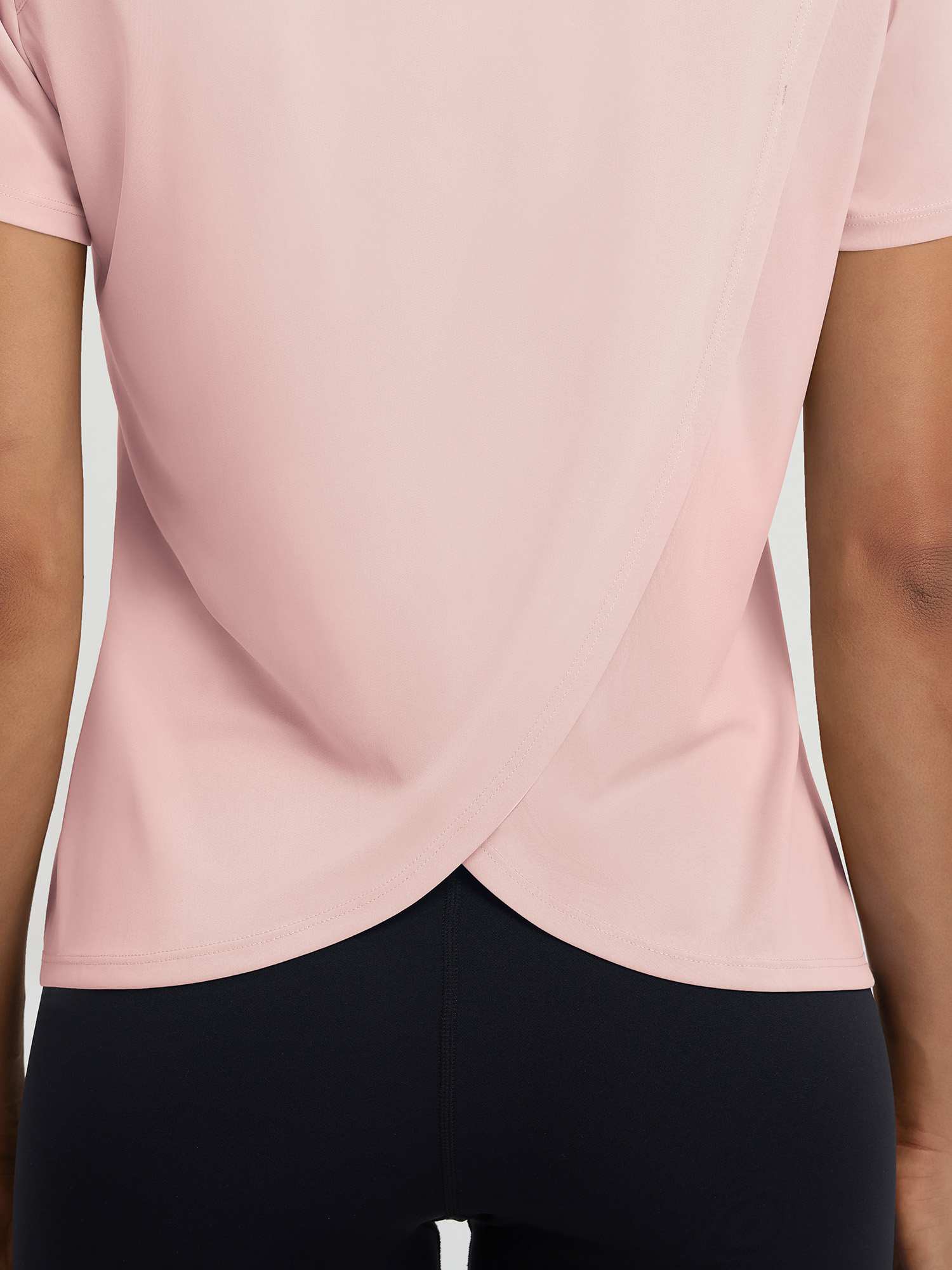 Women's pink quick dry short sleeve athletic top with open split back #color_Pink Dogwood