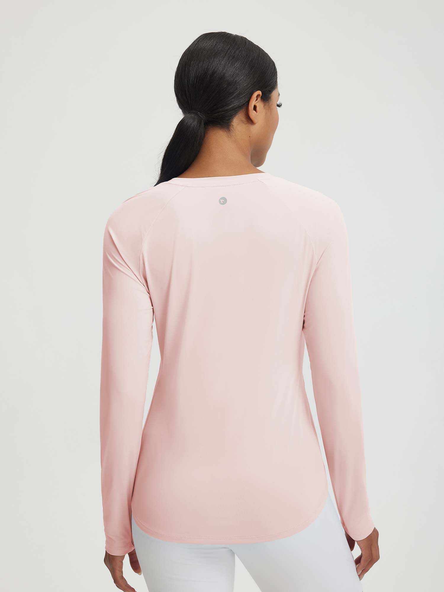 Pink Baleaf UPF 50+ long-sleeve athletic shirt, back view with raglan sleeves & curved hem. #color_Pink Dogwood