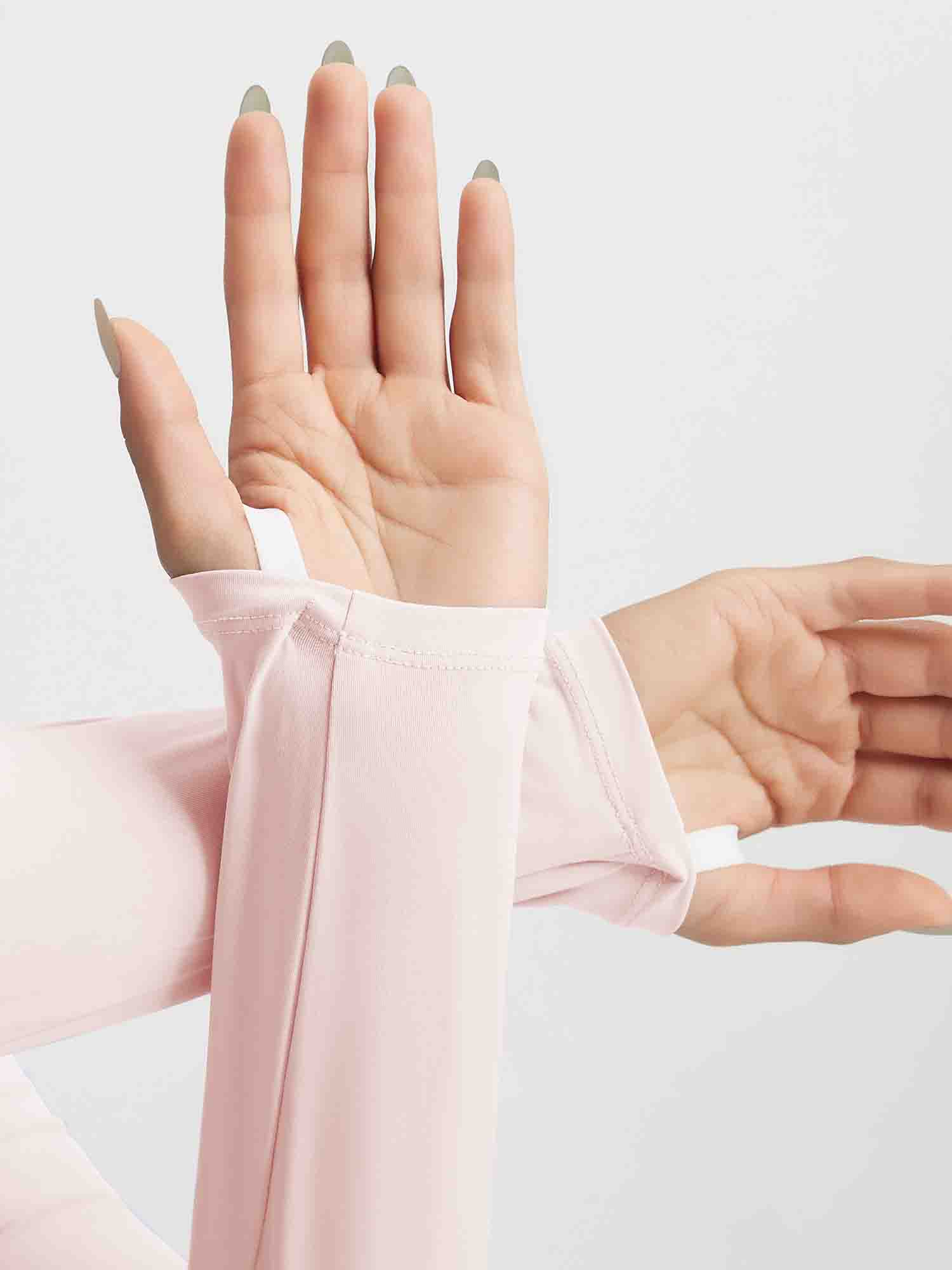 Baleaf UPF 50+ icy cool long-sleeve shirt in light pink, showing thumbholes. #color_Pink Dogwood