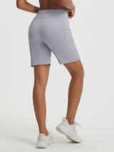Baleaf light grey high-rise 7" running shorts with deep side and zippered pockets. #color_Light Gray